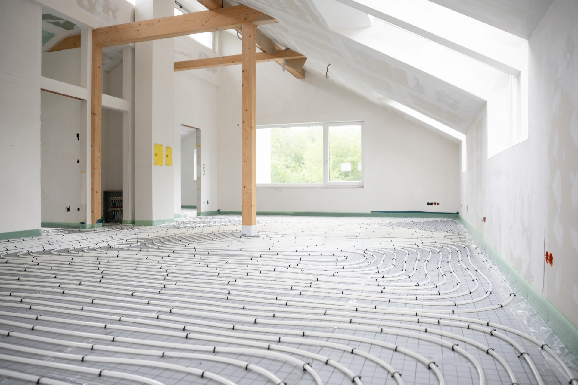 Shot of construction site in a loft where floor heating has just been installed